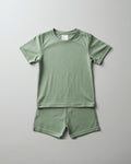 Kids plain green cotton co-ord set - half sleeve t-shirt and shorts flat lay