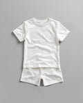 Kids plain white cotton co-ord set - half sleeve t-shirt and shorts flat lay