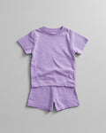 Kids plain lavender cotton co-ord set - half sleeve t-shirt and shorts flat lay