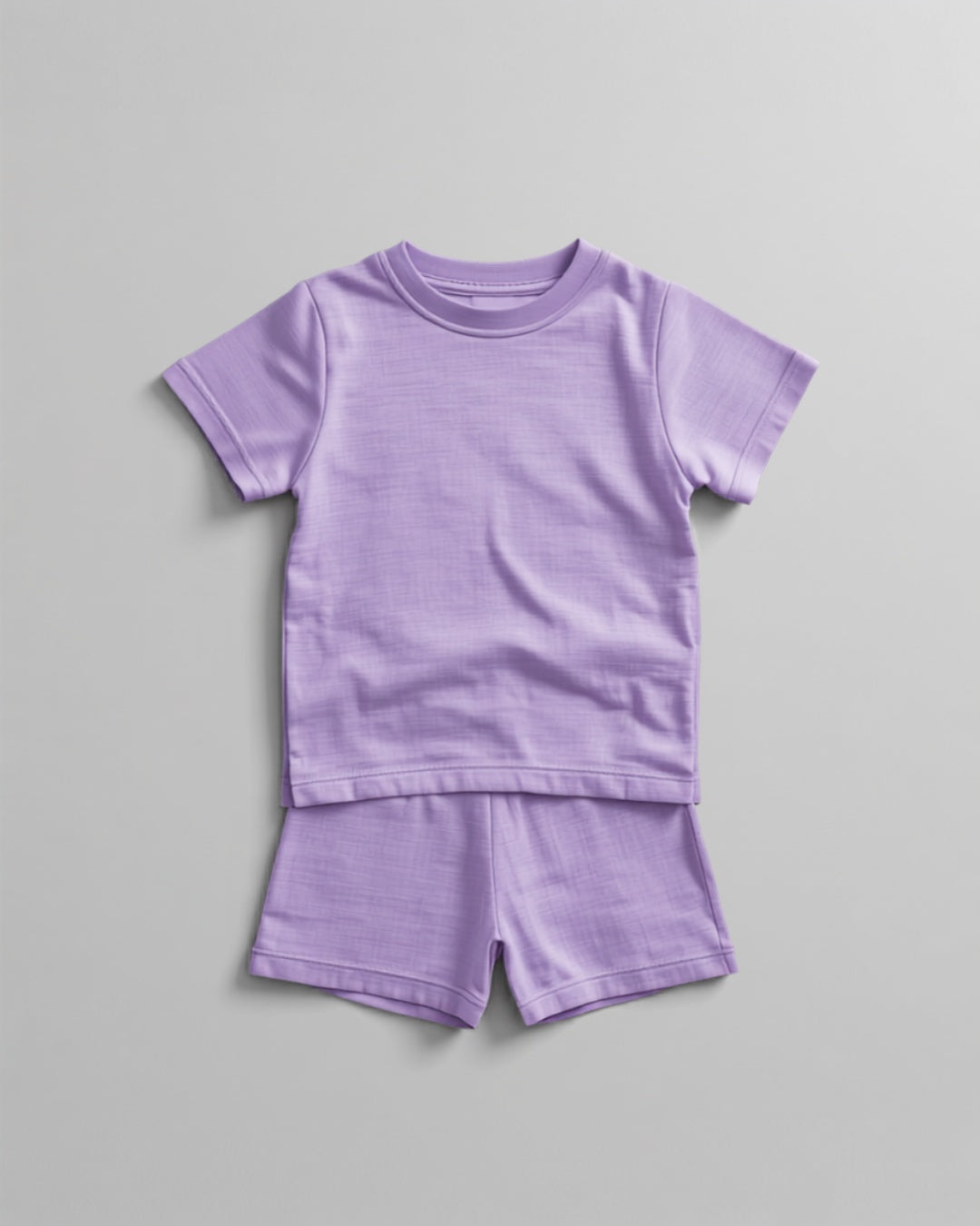 Kids plain lavender cotton co-ord set - half sleeve t-shirt and shorts flat lay