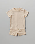 Kids plain beige cotton co-ord set - half sleeve t-shirt and shorts flat lay